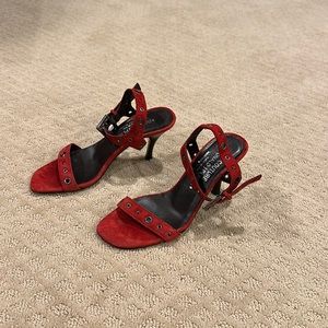 Donald Pliner red suede sandal.  Grommet detail.
